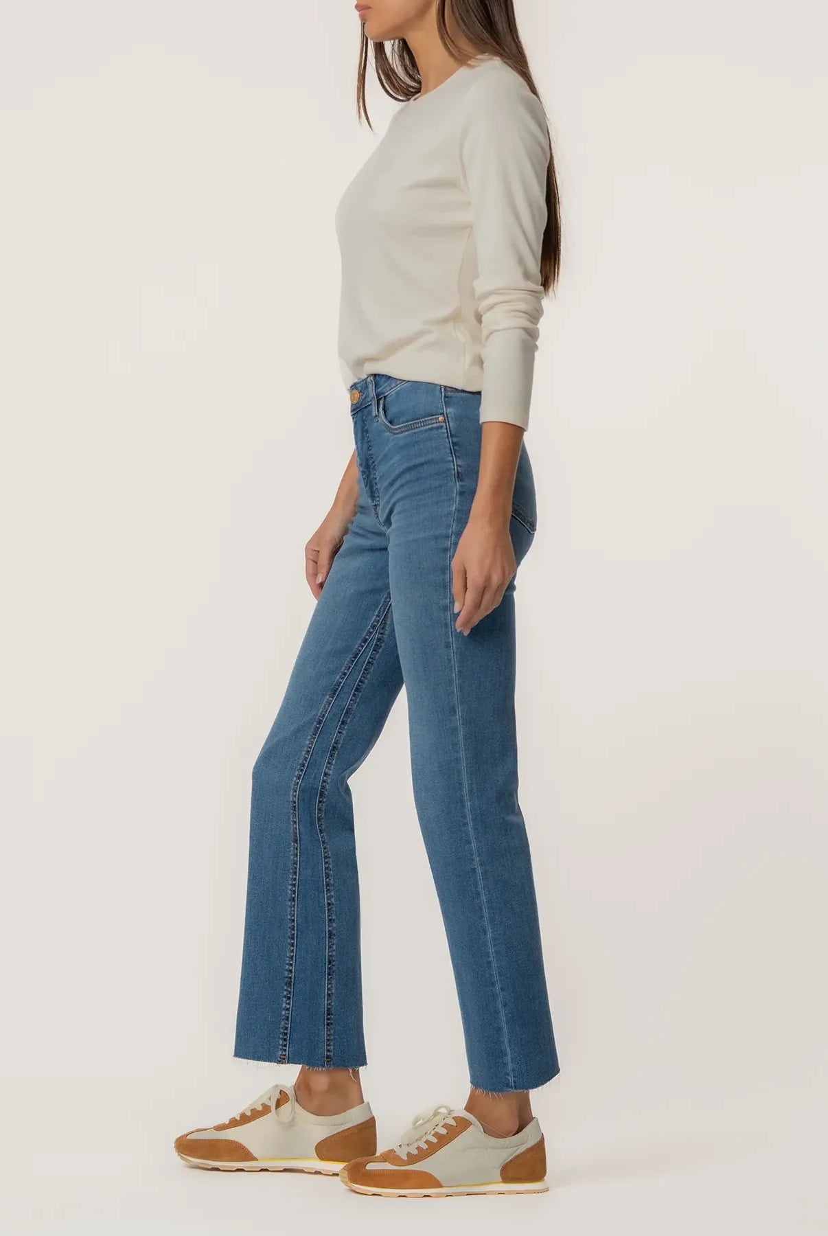Kelsey High Rise Fab Ab Jeans in Sentiment by Kut from the Kloth, showing the side view of stylish blue denim bottoms.