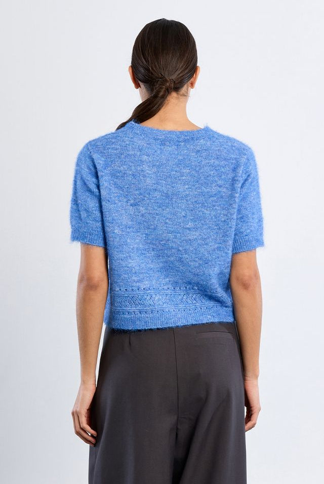 Ruth Top by Molly Bracken in Blue, back view, cropped boucle knit sweater, crew neckline, short sleeves with frayed edges, open pointelle hem trim, boxy silhouette Style# LAL705EN