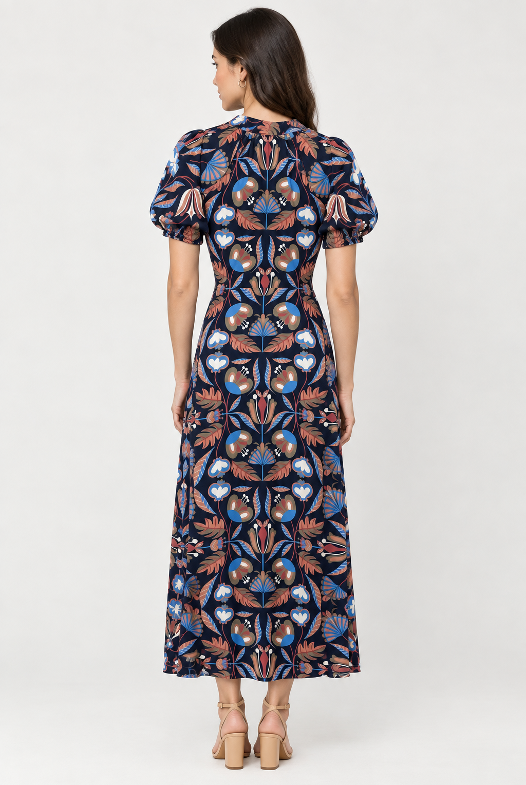Abby Dress by Sail to Sable in navy geometric floral print, front view showing the tie waist