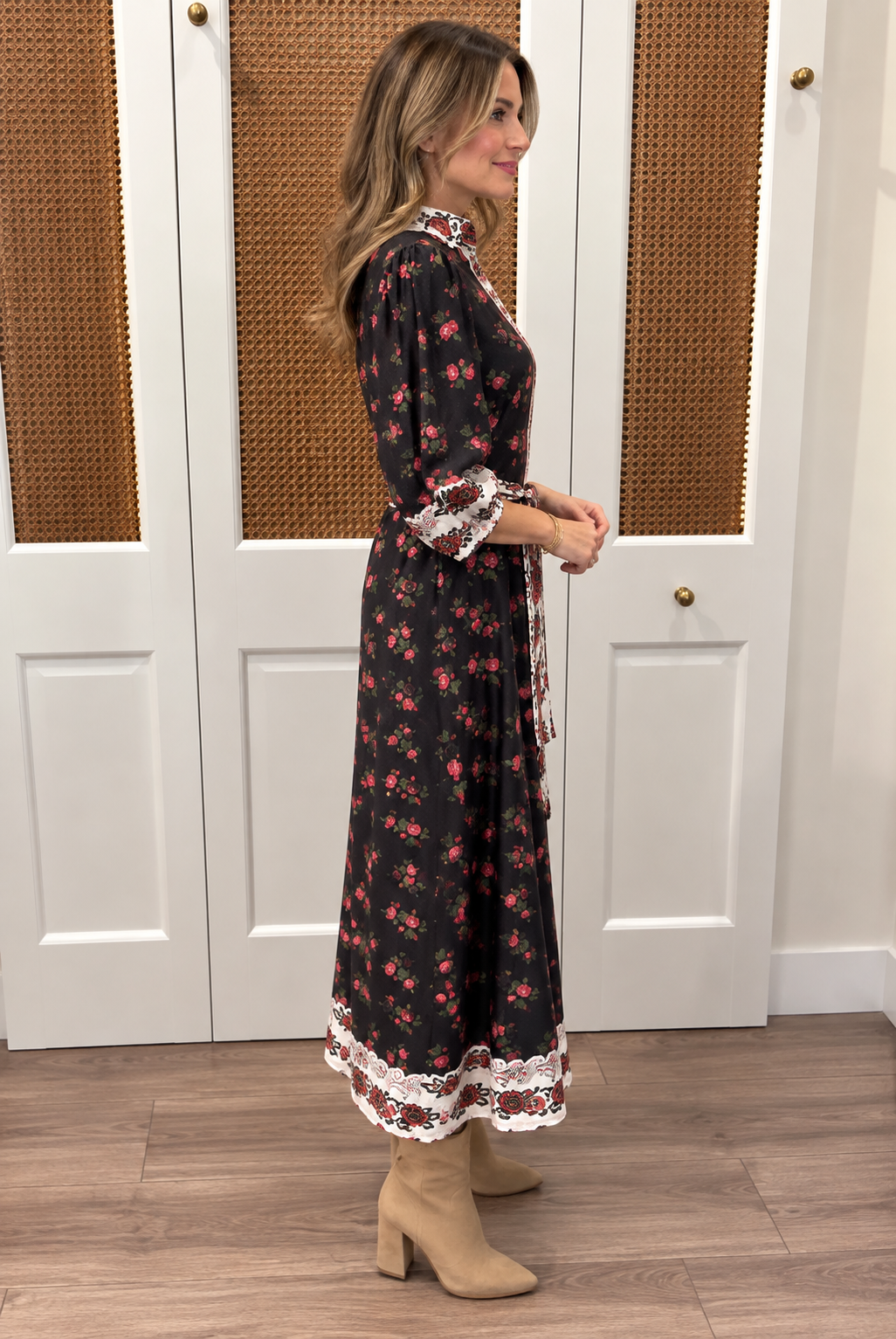 Brooks Dress by Smith & Quinn in Dream Garden — black rose print midi dress with A-line skirt and ivory border hem trim, side view