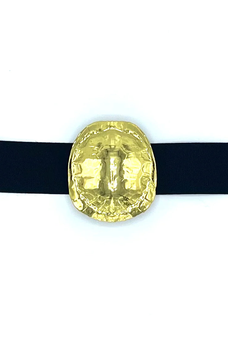 Garland Bags turtle-shaped buckle accessory with detailed turtle design on a neutral background