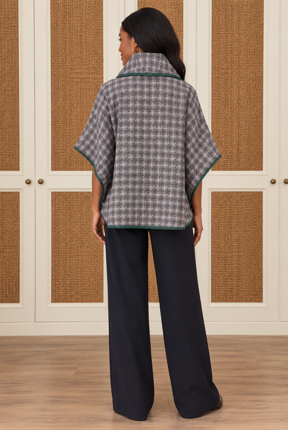 Dorothy Top by Voy in gray-and-ivory houndstooth with a cowl neck, wide sleeves, and deep green trim, back view