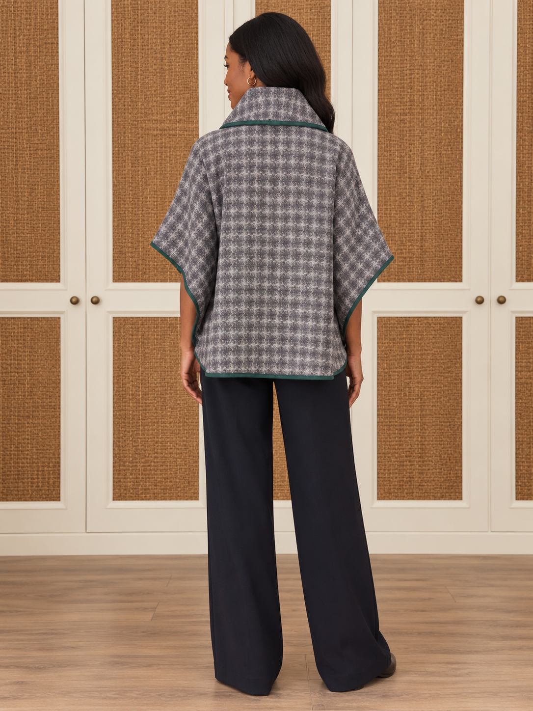 Dorothy Top by Voy in gray-and-ivory houndstooth with a cowl neck, wide sleeves, and deep green trim, back view