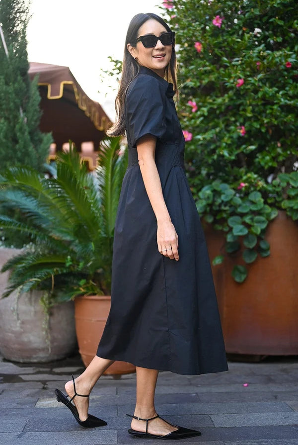 Axel Dress by Wyatt Wylde - black cotton maxi dress with short sleeves and fitted waist, side view