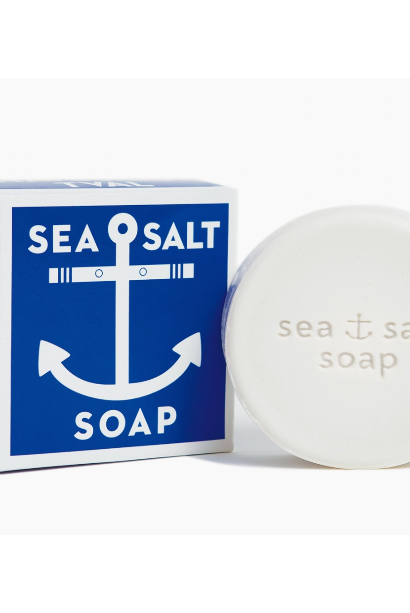 Marj & Lizzie sea salt soap bar with natural ingredients, showcasing its textured surface and rustic packaging for health and beauty.