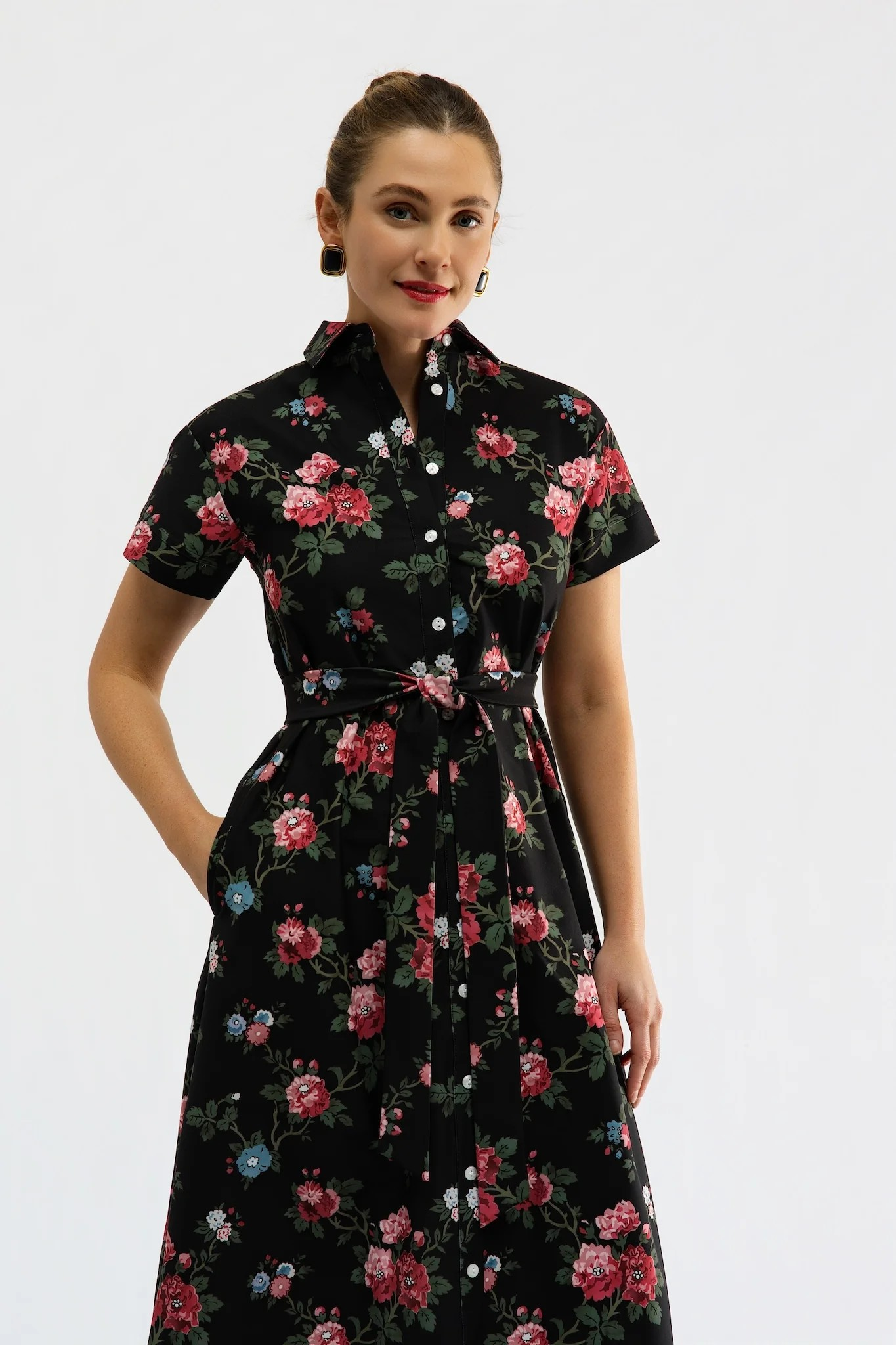 Miller Dress Duchess Rose by Smith & Quinn in black floral print, showing collar, buttons and waist tie, front detail