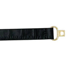 Black leather skinny belt from Garland Bags, featuring a sleek design and adjustable buckle for accessories and fashion style.