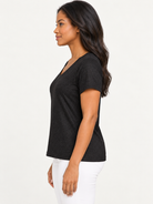 Amaya Top by Another Love in black, side view showing short sleeves and gently relaxed silhouette