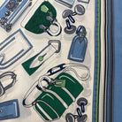 German Fuentes handbag scarf accessory featuring a stylish, colorful design draped over a handbag for a chic look.