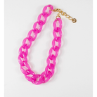 Pink chain necklace on a white background