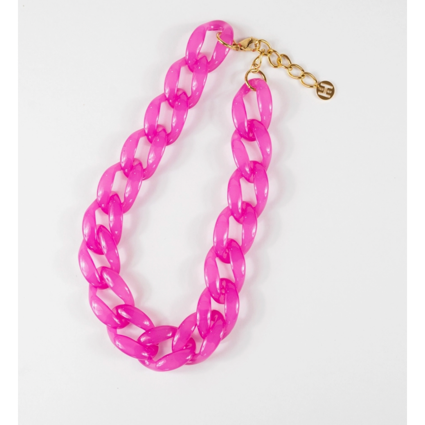 Pink chain necklace on a white background