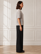 Another Love Amila Top in heather gray, short-sleeve pointelle knit sweater with banded hem, side view