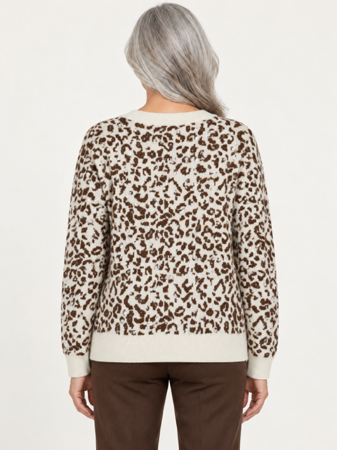 Mina Sweater by Another Love, back view showing leopard pattern, long sleeves, and contrasting cream trim