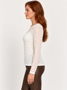 Rafaela Top by Another Love in ivory, side view showing sheer burnout sleeves and gently fitted silhouette