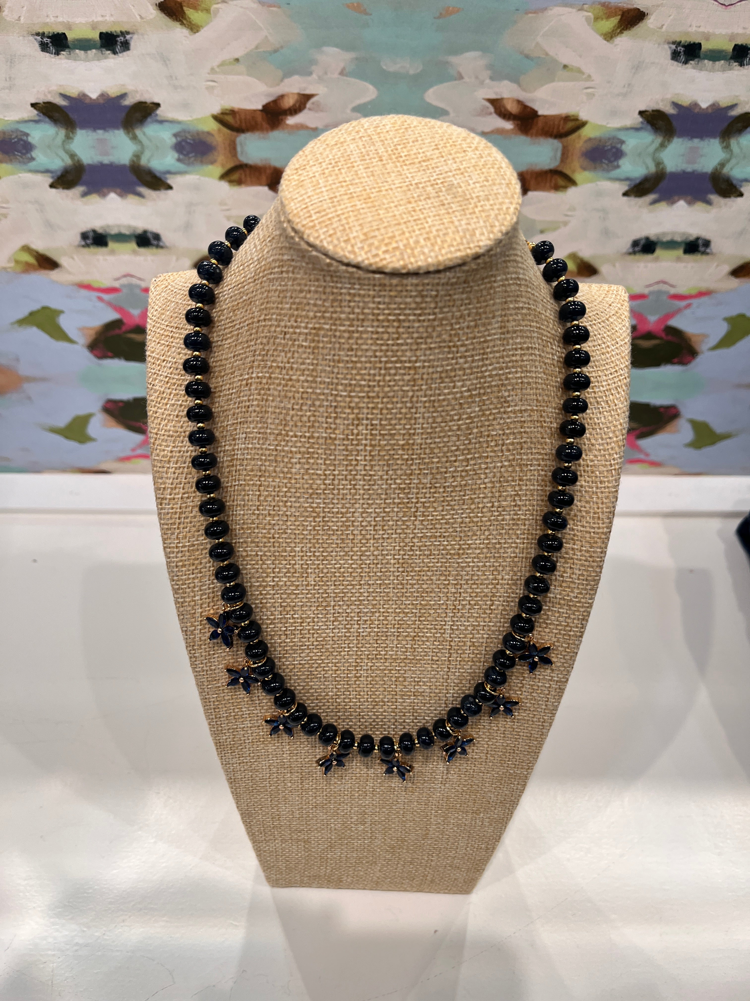Beaded Bloom Necklace Navy by Smith and Co. Design — navy glass beads with CZ floral charms on marble