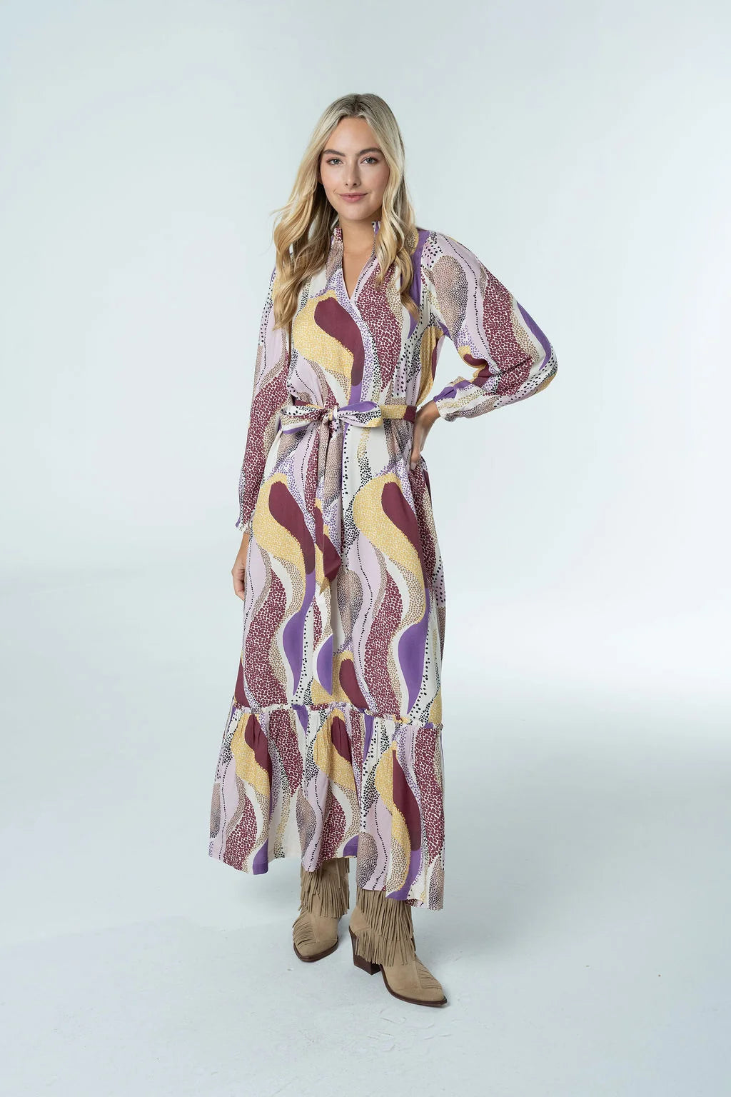 Briton Court Evelyn Maxi Dress in Desert Mirage abstract swirl print, long sleeve wrap silhouette with tiered maxi hem, three-quarter view. Style# 3917