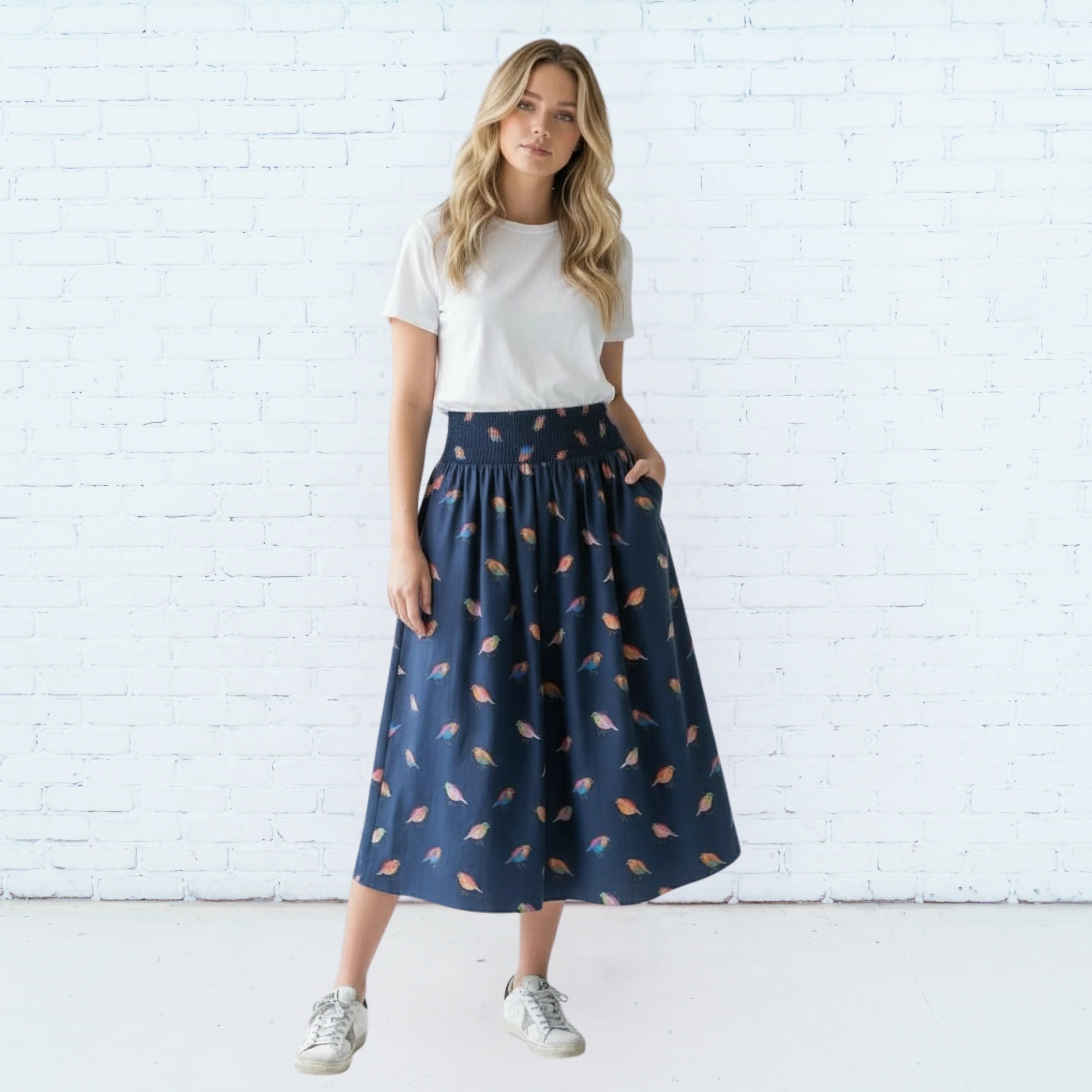 Caryn Lawn Sutton Skirt in navy bird print, full-length midi skirt, elastic waistband, front view
