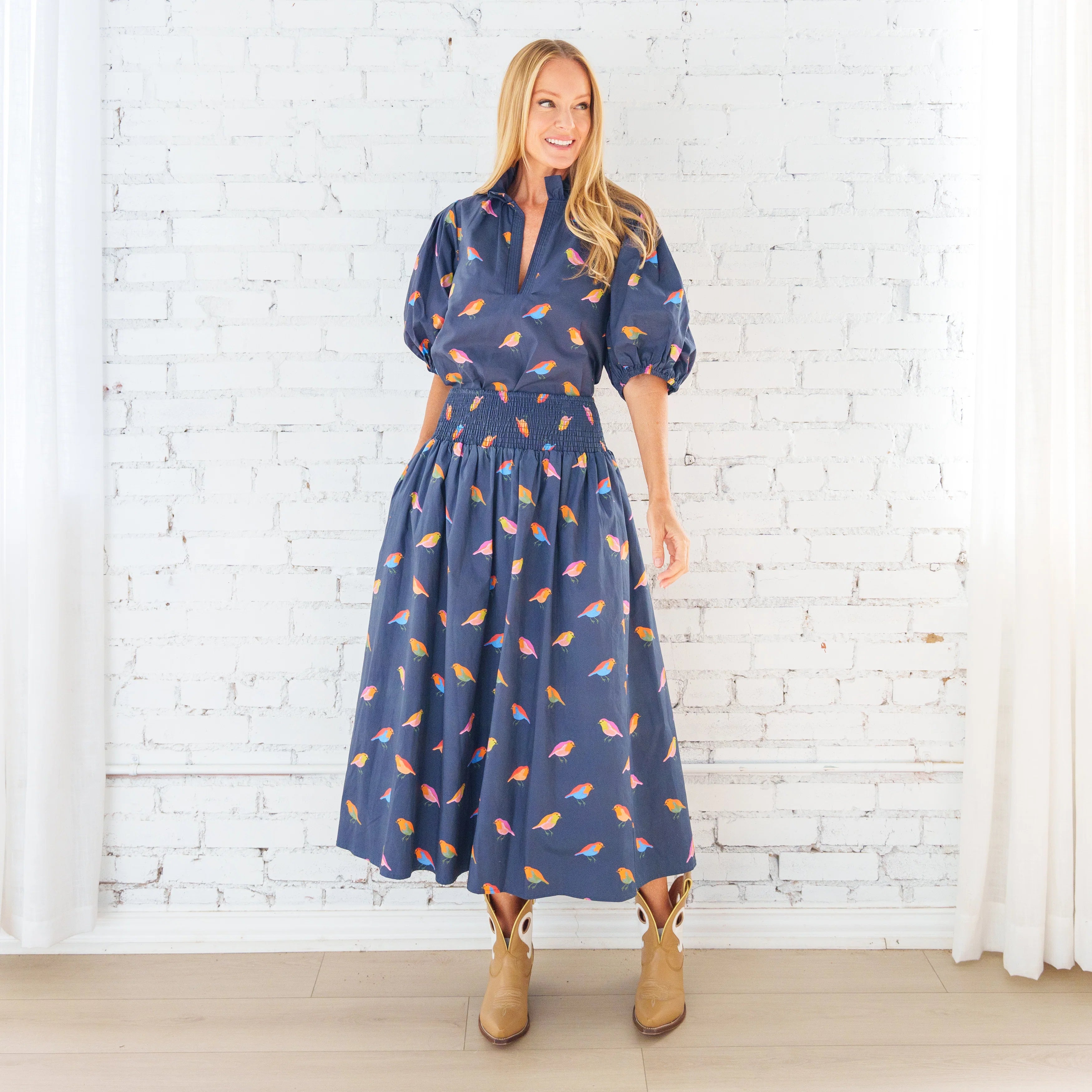 Caryn Lawn Sutton Skirt in navy bird print, full-length midi skirt, smocked waistband, full view