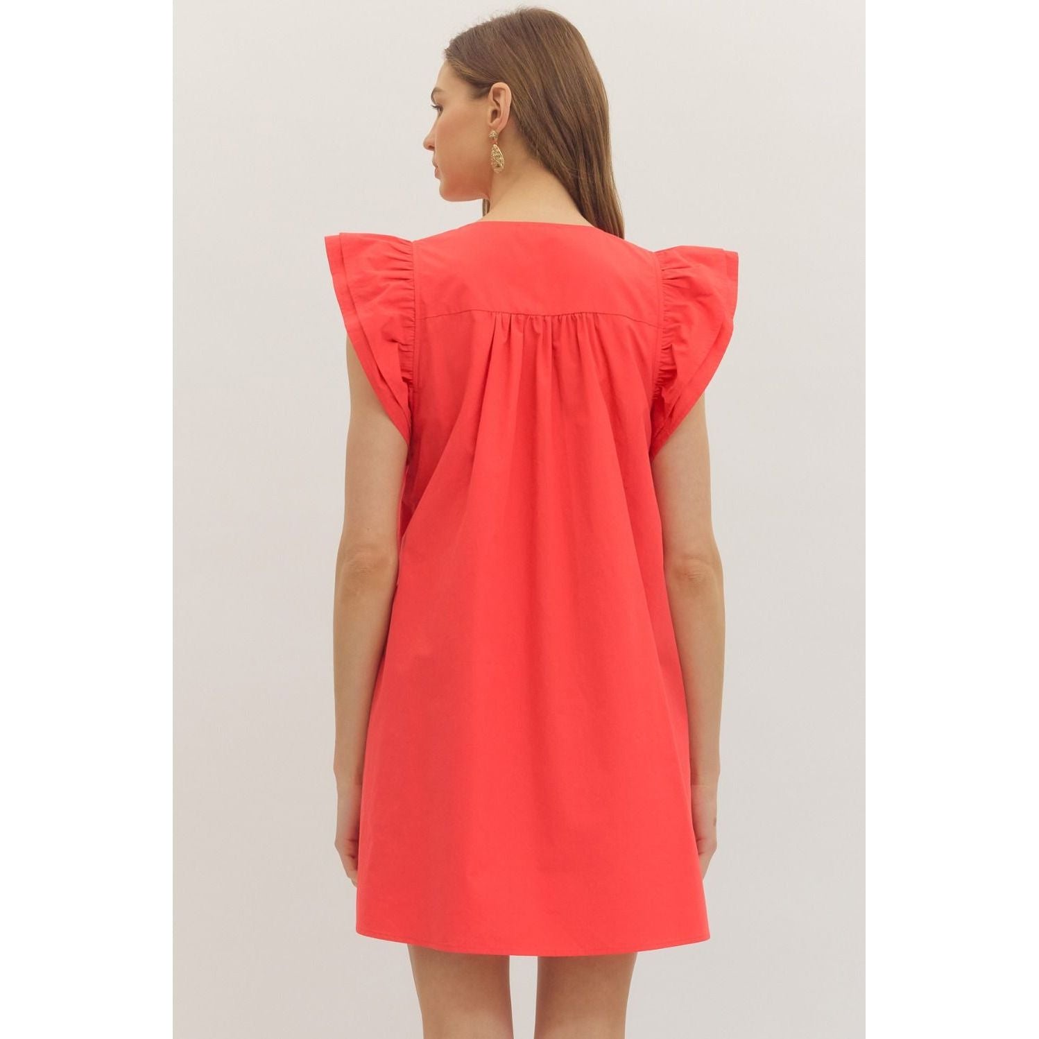 Ruby Dress by Entro — back view, coral red mini dress with ruffle sleeves and gathered yoke detail