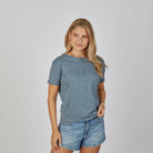 erin gray Celia Perfect Length Tee in denim blue, short sleeve, center seam detail, three-quarter view