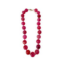 Hot pink Mabry chunky beaded necklace by Gemelli, featuring large colorful beads and a stylish jewelry design.