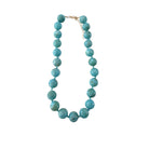 Gemelli Mabry chunky beaded necklace featuring vibrant turquoise beads and a stylish jewelry design.