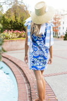 Beaufort A-Line Mini Dress in Blue Lapis by House of MBR — back view, cobalt blue medallion print, oversized gingham bow straps