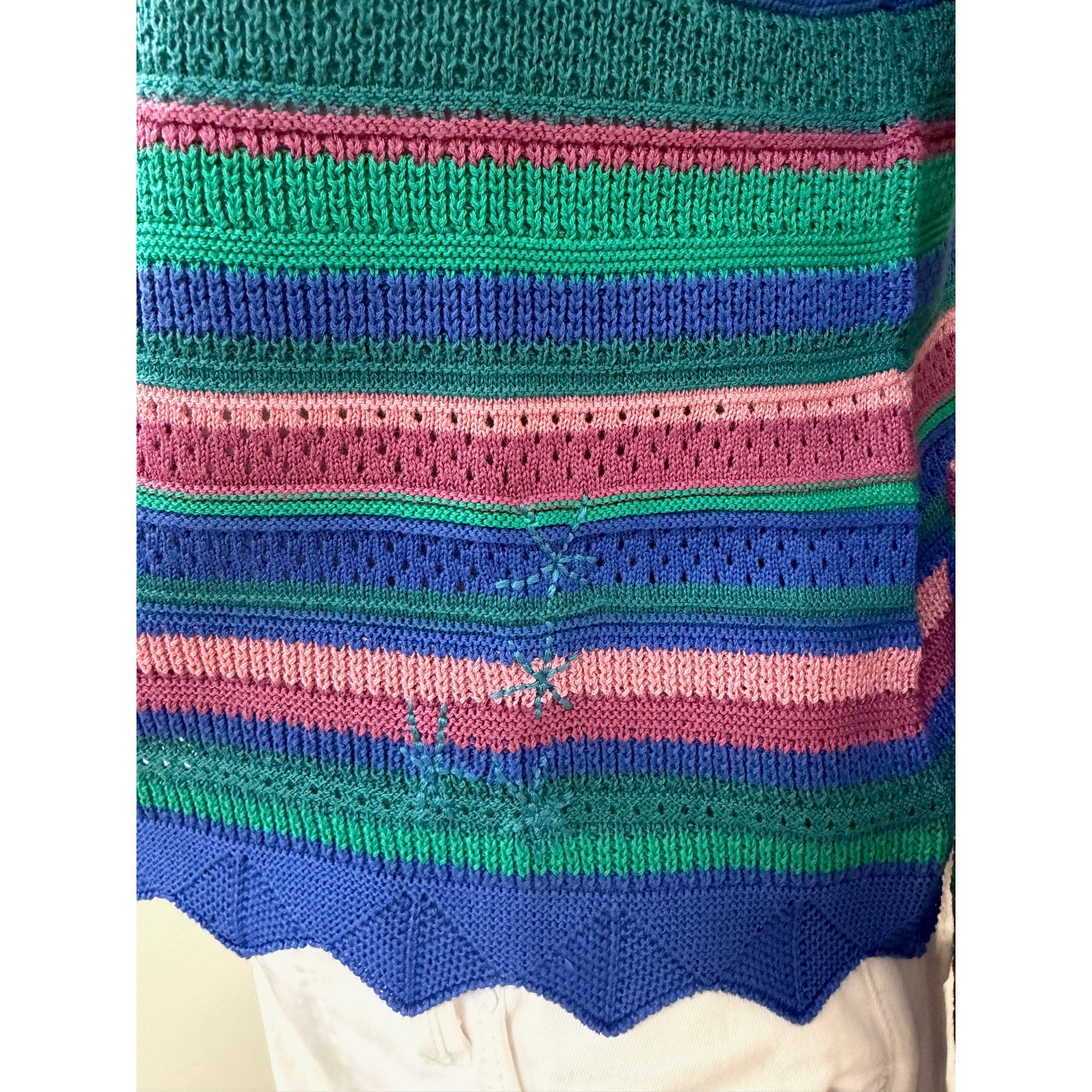 Alivia Abigail sweater in soft knit fabric, navy blue color, long sleeves, and classic crew neckline, displayed on a hanger.