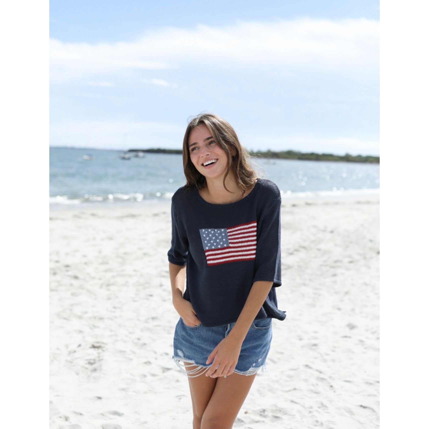 Wooden Ships flag half sleeve sweater top with a nautical flag design, soft knit fabric, and casual fit.