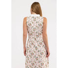 Smith & Quinn Paige dress displayed on a hanger, showcasing its elegant fabric and stylish design suitable for casual or formal wear.