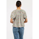 Smith & Quinn Imogen Top, stylish women's blouse with a relaxed fit and soft fabric, displayed on a hanger.