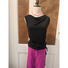 Elan Anamaria top displayed on a hanger with a lightweight, flowy fabric and stylish design, perfect for casual or dressy wear.