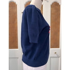 Navy puff sleeve flag sweater top by Duffield Lane, featuring a cozy knit with bold flag design and puffed sleeve details.