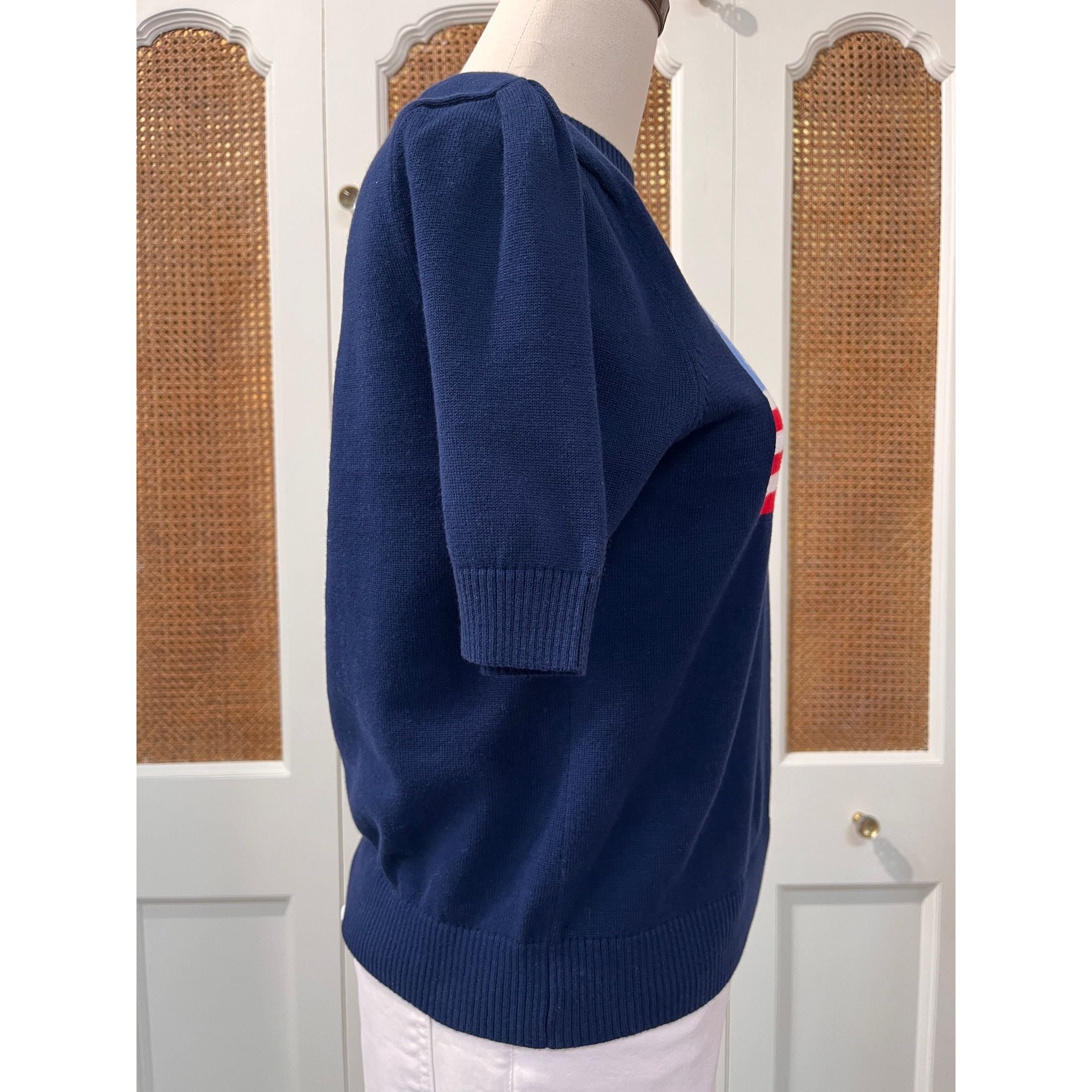 Navy puff sleeve flag sweater top by Duffield Lane, featuring a cozy knit with bold flag design and puffed sleeve details.
