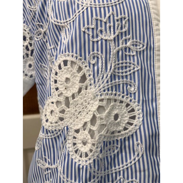 JADE Edna Top front view, stylish sleeveless blouse in soft fabric with V-neck and subtle detailing, perfect for casual wear