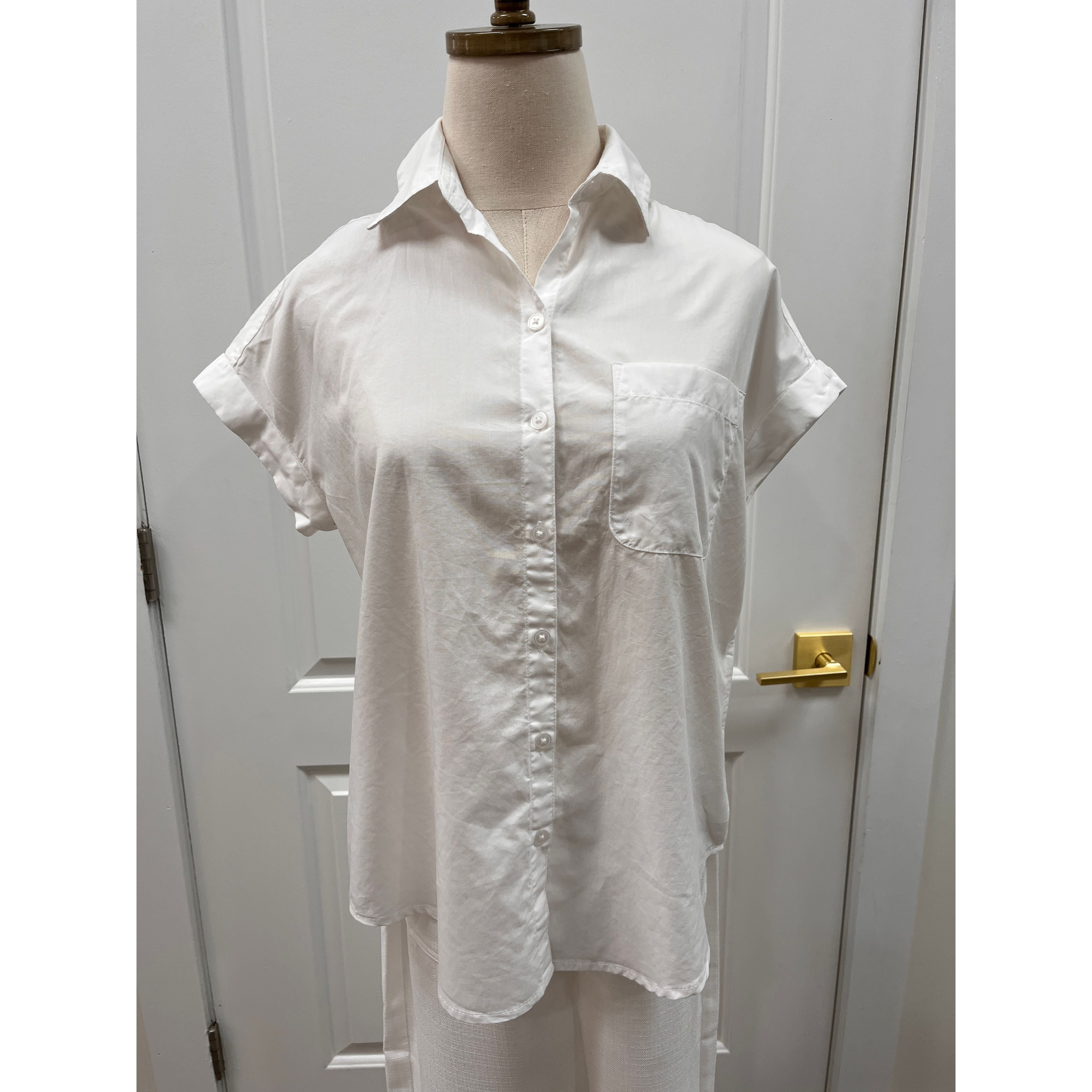 Lola River Amara top in soft fabric, featuring a stylish neckline and relaxed fit, shown in a front view image.