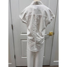 Lola River Amara Top displayed on a hanger, featuring a stylish design in soft fabric with a V-neck and short sleeves.
