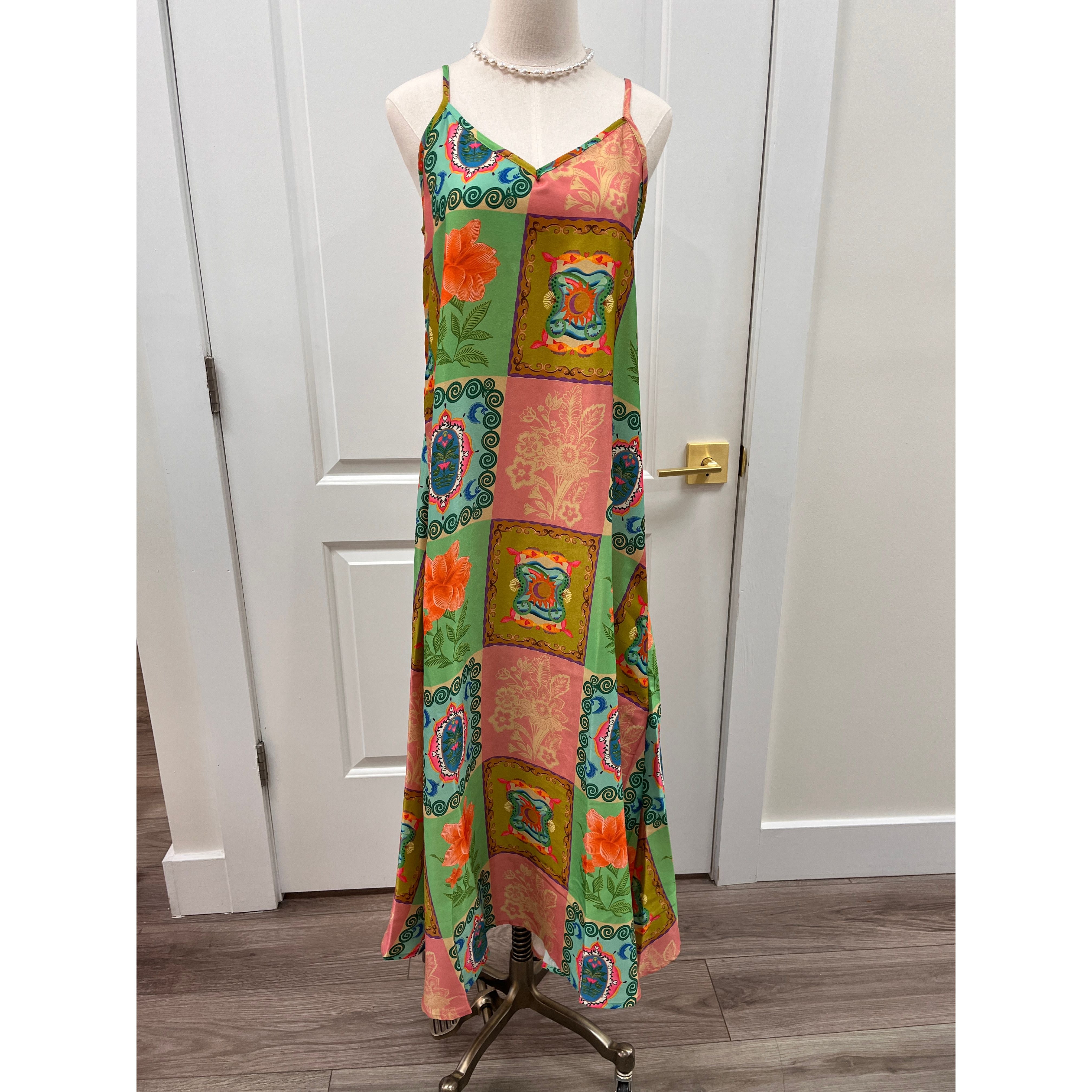 Briton Court Camille dress in soft fabric with a fitted bodice and flowing skirt, displayed on a mannequin.