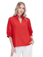 Anne Top by Jade in red, front view showing V-neck collar and elastic-cuffed sleeves