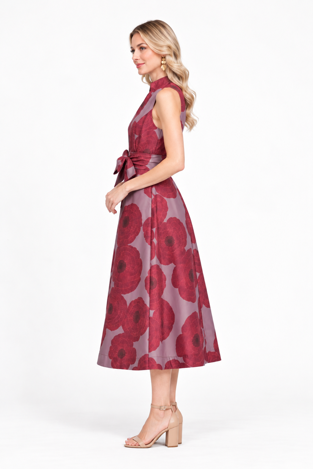 Clara Dress by Jade in crimson poppy, side view showing sleeveless bodice, waist sash, and midi skirt