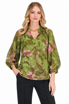 Camilla Top by Jade in Whimsical Garden, front view with green and pink floral print, split neckline, and balloon sleeves