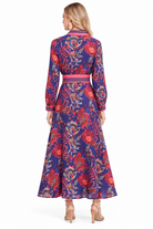 Annabelle Dress by Jade in Hibiscus Royale, back view with floral print, striped waist sash, and long sleeves