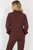 Edie Top by Molly Bracken in chocolate brown with gold-tone half zip, stand collar, and long sleeves, back view