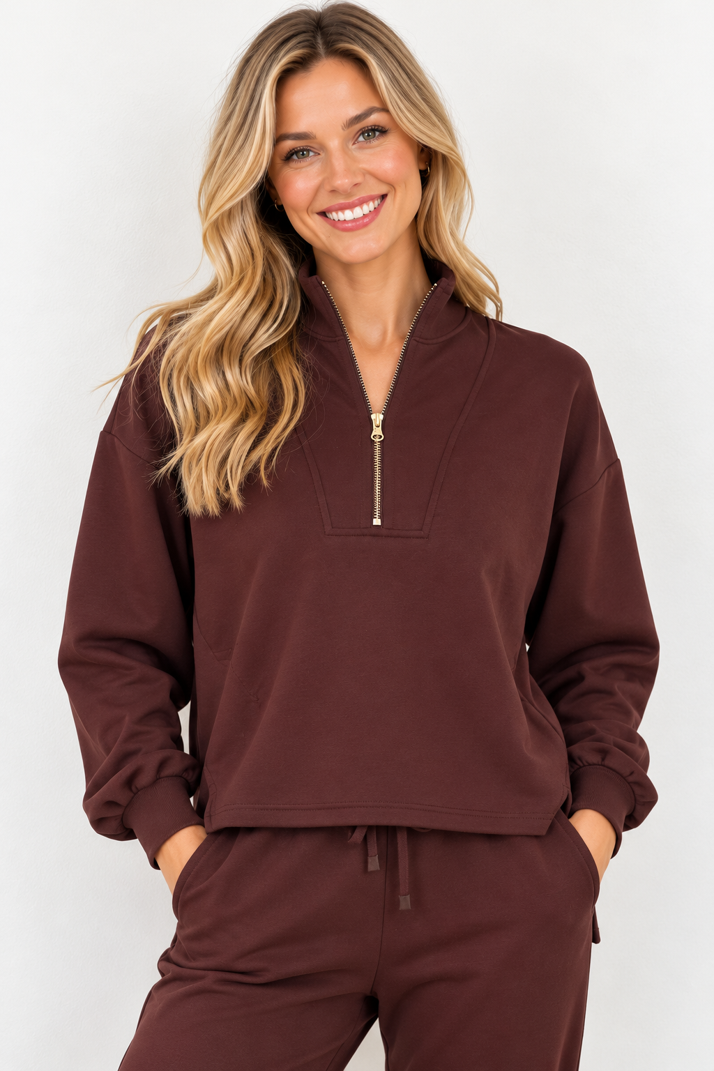 Edie Top by Molly Bracken in chocolate brown with gold-tone half zip, stand collar, and long sleeves, front view