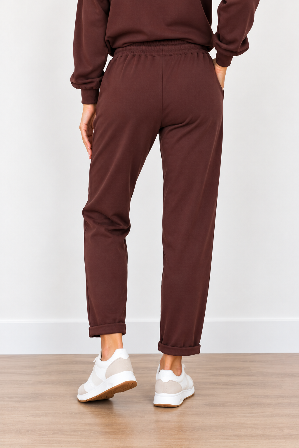 Jackie Pants by Molly Bracken in chocolate brown with drawstring waist, side pockets, and tapered legs, back view