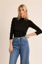  Nancy Top by Molly Bracken in Black, front view, fitted mock turtleneck, long sleeves with subtle shoulder ruching, slim silhouette, fine ribbed texture style # EF1662EN