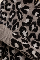  Charlotte Sweater by Molly Bracken, close-up of black leopard spots with metallic sparkle and grey ribbed cuff