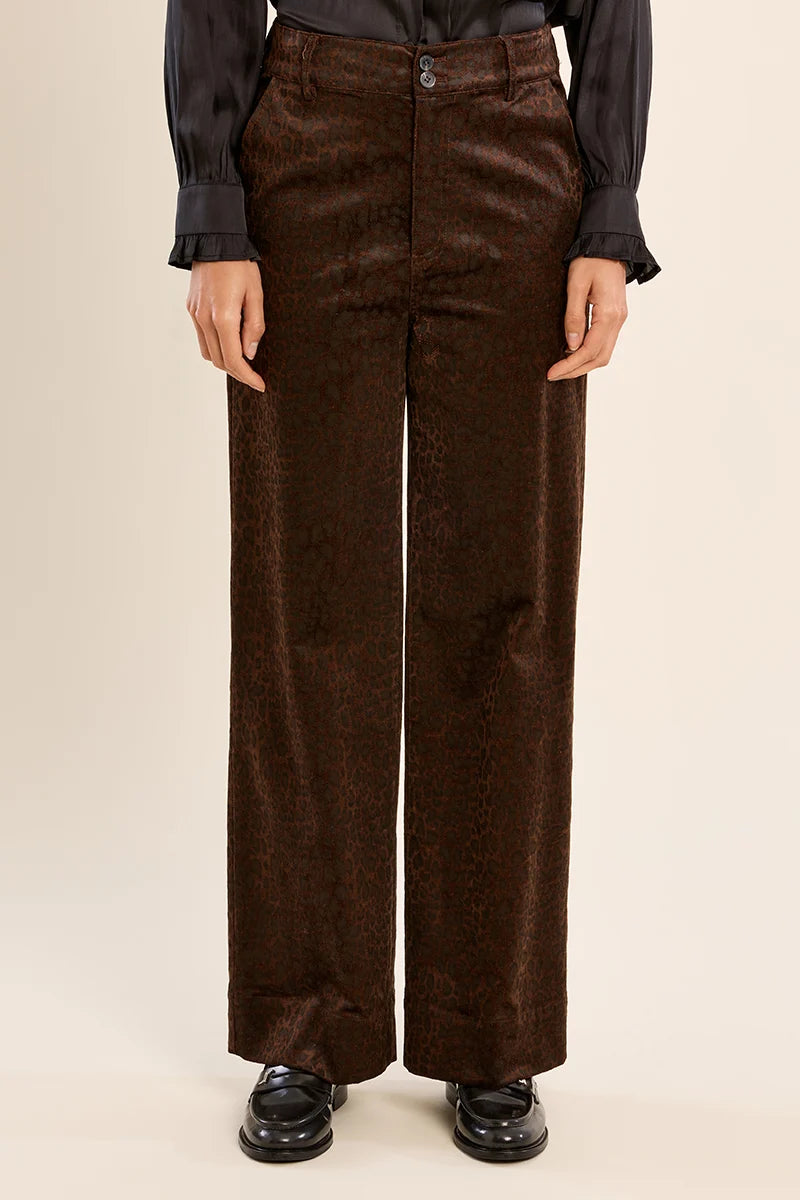 Finley Trousers by Molly Bracken, close-up of brown satin animal print with two-button high waist and front fly