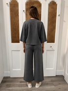 Presley Top Charcoal by P.Cill — 3/4 sleeve Butter Modal round neck top, back view