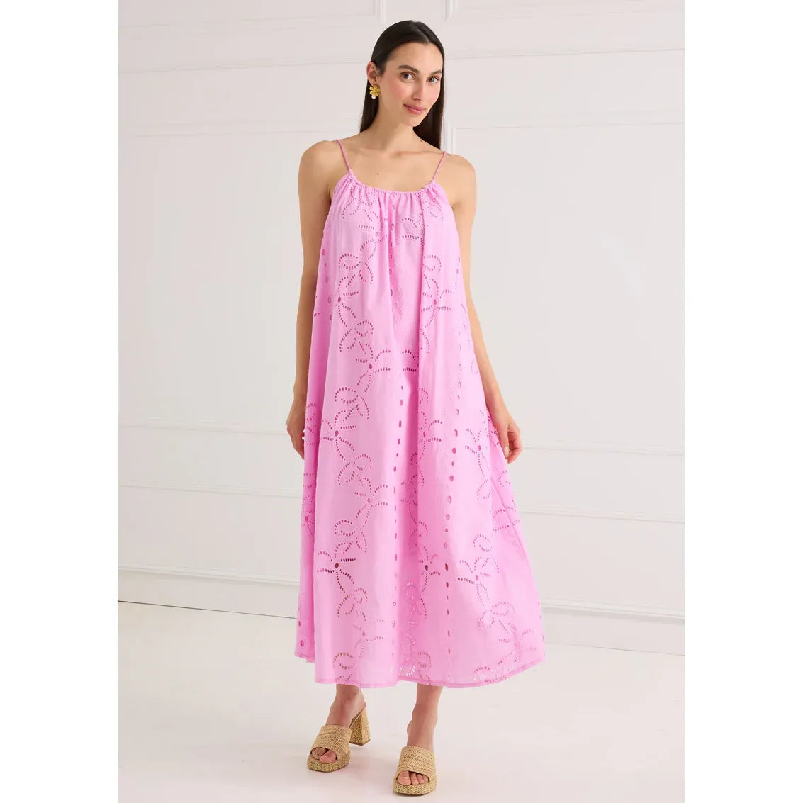 Pink Alivia Adele dress with eyelet fabric, showcasing a feminine, stylish design perfect for summer or special occasions.